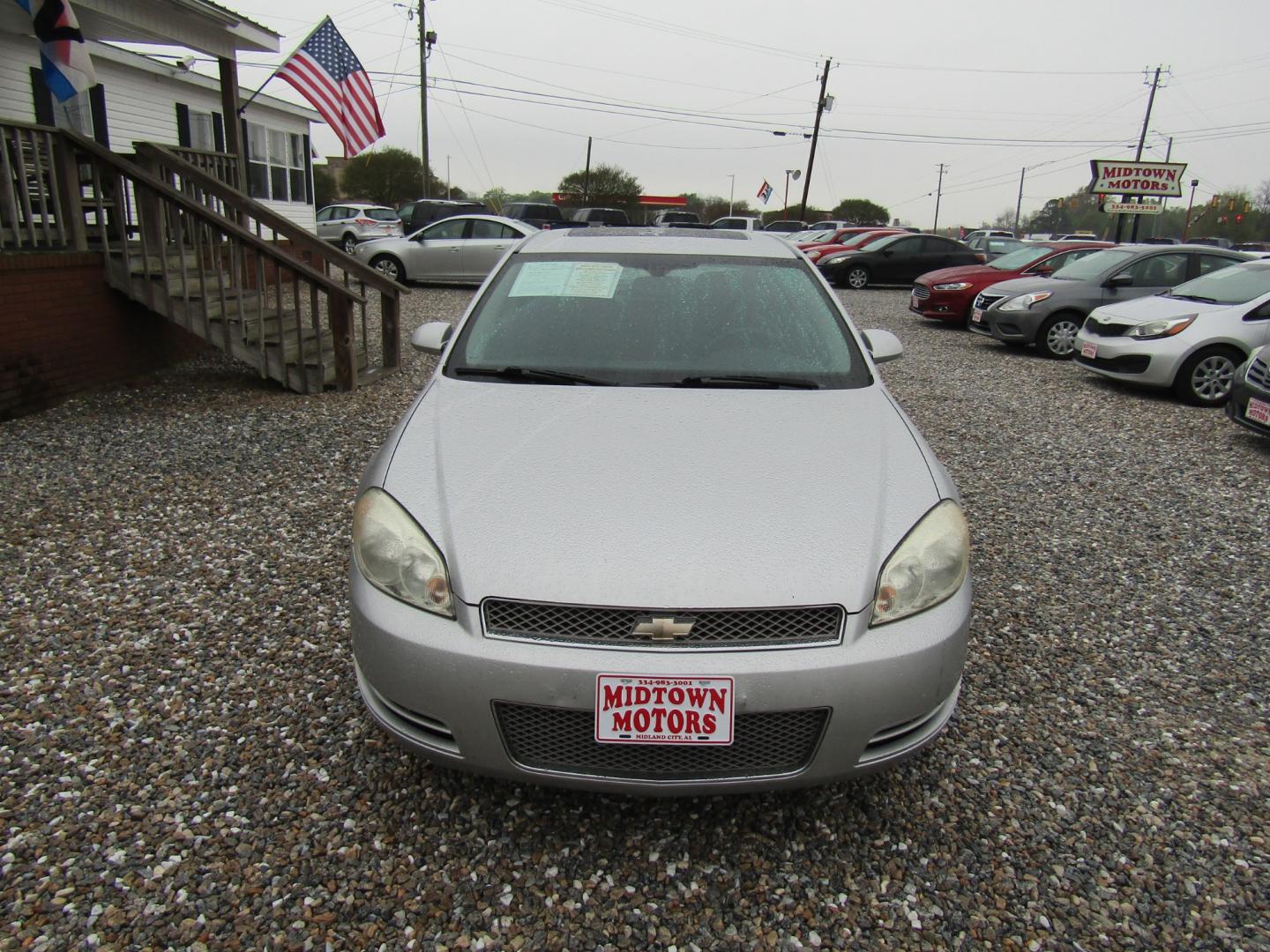 2014 Silver Chevrolet Impala LT (2G1WB5E30E1) with an 3.6L V6 DOHC 16V FFV engine, Automatic transmission, located at 15016 S Hwy 231, Midland City, AL, 36350, (334) 983-3001, 31.306210, -85.495277 - Photo#1